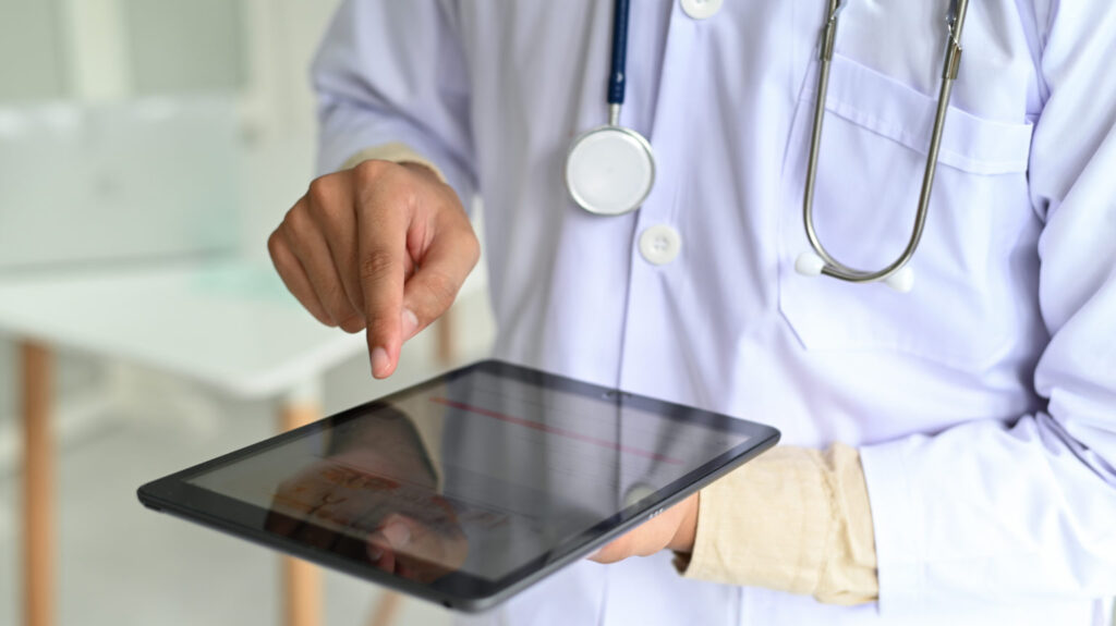 The Importance of Translation to the Medical Device Market medical personnel in lab gown with stethoscope are 2021 09 02 15 26 12 utc 1536x863 1 Cropped shot of Medical personnel in lab gown with stethoscope are searching for medical information with tablet.